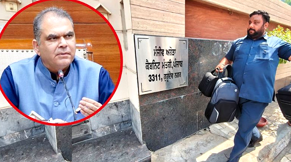 ED officials outside Punjab Minister Sanjeev Arora residence during raid