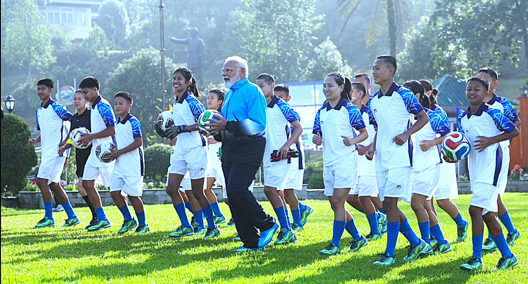 Prime Minister Narendra Modi playing football with youth in Gangtok during Sikkim visit