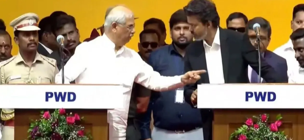 Tamil Nadu Chief Minister Vijay speaks emotionally during swearing-in ceremony as Governor Arlekar looks on.