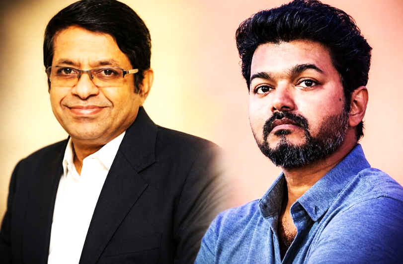 Tamil Nadu Chief Minister Vijay during discussion with astrologer Radhan Pandit Vetrivel after OSD appointment.