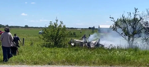 Emergency teams respond after a civilian skydiving aircraft crashes near Tomblain Airport in France.