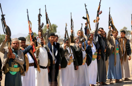 Yemeni soldiers secure a military position after a Houthi attack near Hodeidah.