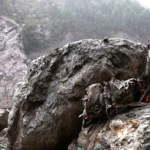 Rescue teams search debris after deadly landslides in China